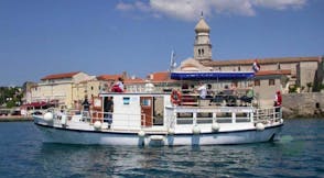 Charming boat ride along 4 islands with swimming, from Krk