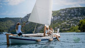 Sail Along the Krka River with a Glass of Wine at Hand