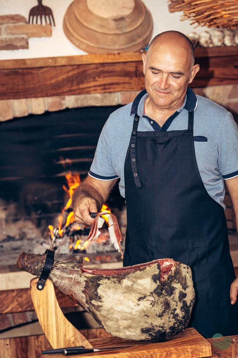 Unique Taste of Prosciutto: Cut Straight from its Stand